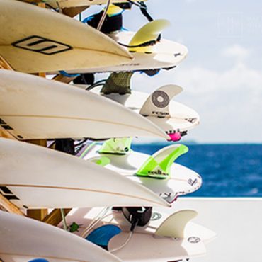 surfboards placed on the surfboard rack of Haira liveaboard